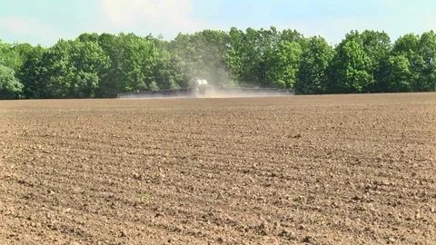 Fertilizing for next year's harvest using a sprayer Stock Footage 145935418