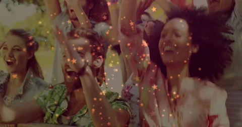 Festival front duo clapping and pumping fists, crowd cheering, stars overlaying Stock Footage 331276018