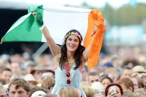 Festival Goers Enjoy The Script On The Main Stage At The Isle Of Wight Festival  Stock Photos
