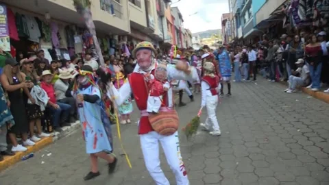 A festival of rebellion brings thousands of devils together in the streets of an Stock Footage 325670151