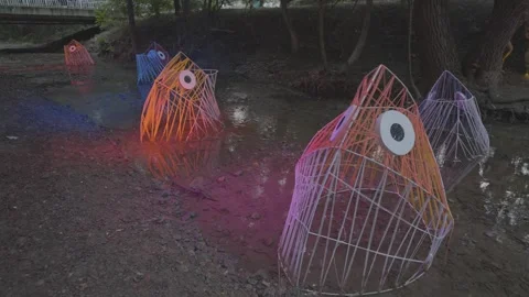 Festival Rivers of Sofia with metal fish in a river Stock-Footage 284459995