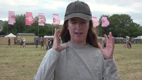 Festivalgoers react to The 1975 headlining Glastonbury Stock Footage 312076497