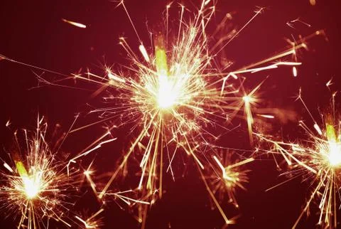 Festive background, bengal light on the dark background Stock Photos