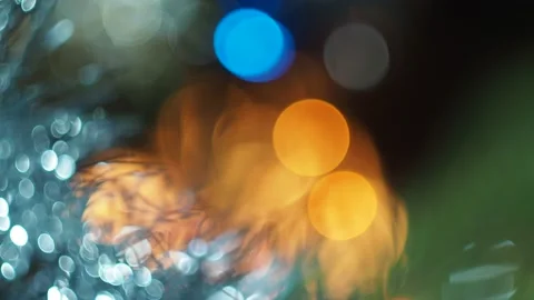 Festive background. Colored spots and lanterns from Christmas toys.Out of focus. 스톡 동영상 145637221