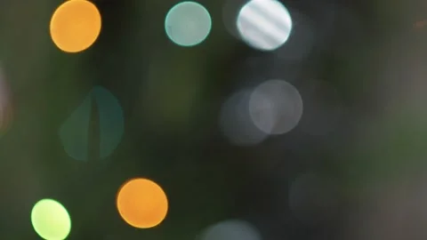 Festive background. Colored spots and lanterns from Christmas toys.Out of focus. Vídeos de archivo 145637241