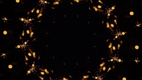 Festive background for congratulations. Bengal fire kaleidoscope on a black back Stock Footage 233029146