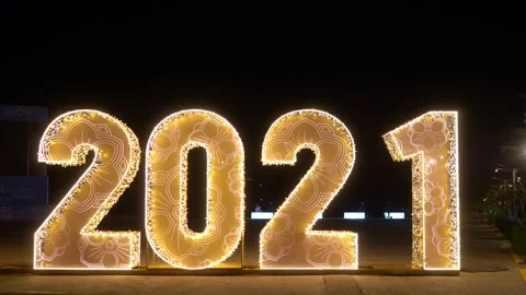 Festive background. figures 2021 With sparkling golden garland Stock Footage 145282059
