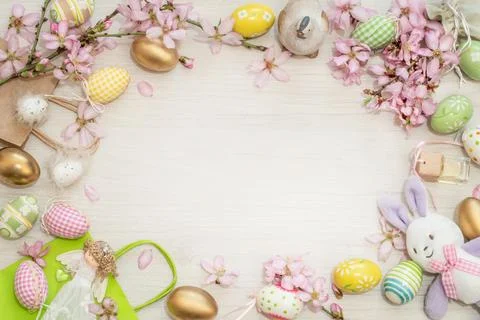 A festive background frame for congratulating them with beautiful Easter eggs Stock Photos