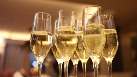 Festive bar display featuring shimmering bubbles and warm ambient lighting Stock Footage 327014003