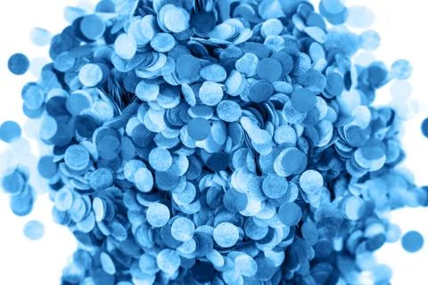 Festive blue confetti background. Flat lay style. Stock Photos