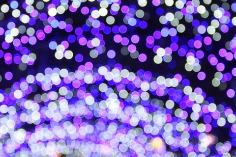 Festive blur background with natural bokeh and bright lights. Stock Photos