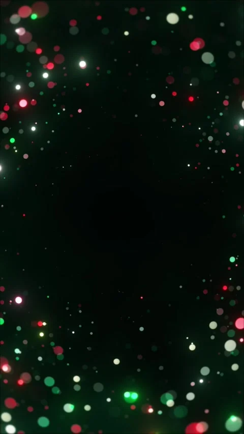 Festive bokeh background featuring vibrant red and green shimmering circles Stock Footage 296149406