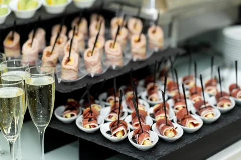 Festive buffet table with many snacks and appetizers Stock Photos