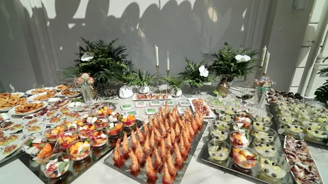 Festive buffet table with snacks and drinks Stock Footage 284712313