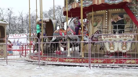 Festive carousel in the square Stock Footage 83094419