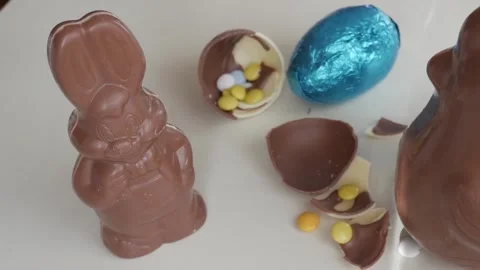 Festive Chocolate Easter Bunny and Eggs with Colorful Candies Stock Footage 332944007