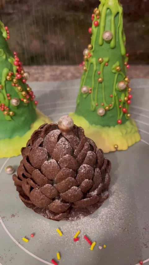 Festive Chocolate Pinecone and Christmas Tree Desserts Stock Footage 345307003