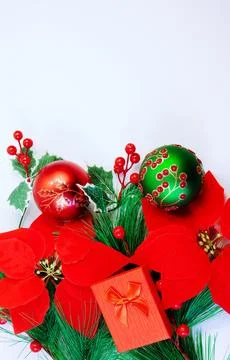 Festive Christmas background featuring red poinsettia flowers Stock Photos