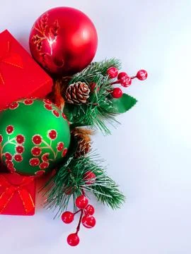 .Festive Christmas background featuring red and green decorative ornaments Stock Photos