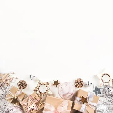 Festive Christmas background with gift boxes and Christmas decorations Stock Photos