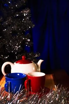 Festive Christmas card. Tea composition with spheres for a fir-tree. Stock Photos