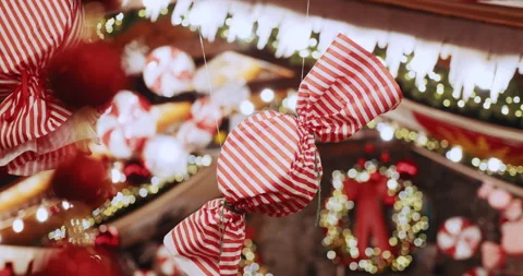 Festive Christmas decorations with candy and garlands in warm home setting Stock Footage 292286012