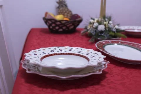 Festive Christmas Dinner Table Setting with Porcelain Stock Photos