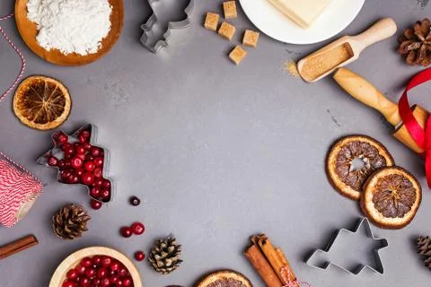 Festive Christmas frame with baking tools and ingredients. Stock Photos