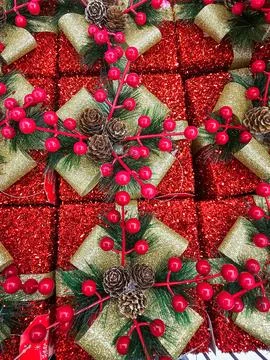 Festive Christmas Gift Pattern with Pinecones and Red Berries Stock Photos
