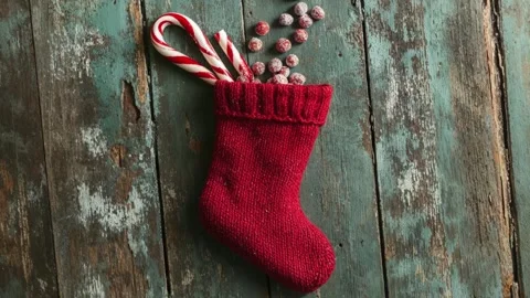 Festive Christmas Stocking Filled With Candy Canes and Sweets Stock Footage 294508319