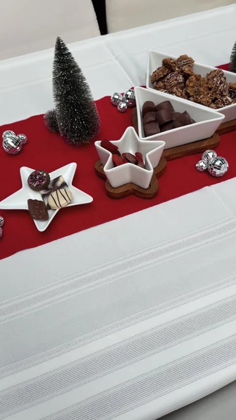 Festive Christmas table decor with chocolate display Stock Footage 327304997