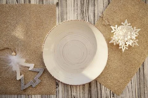 Festive Christmas table serving mock up. Vintage beige plate with Christmas Stock Photos
