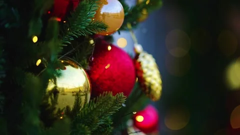 Festive Christmas tree decorated with red and gold ornaments Stock Footage 322056128