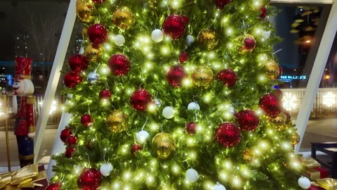 Festive Christmas Tree with Gold-Wrapped Presents and Holiday Decorations Stock Footage 293958595