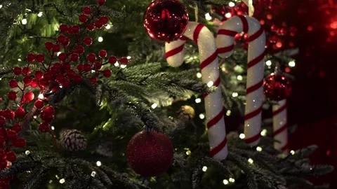 Festive Christmas Tree with Lights, candy canes and Holiday Decorations. 4K Video stock 341487641