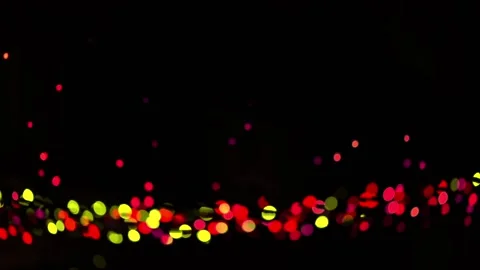 Festive colored defocus lights on dark background 動画素材 234662754