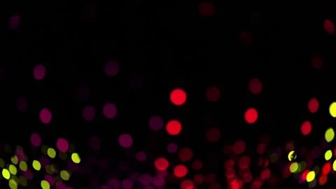 Festive colored defocus lights on dark background Video stock 237507688