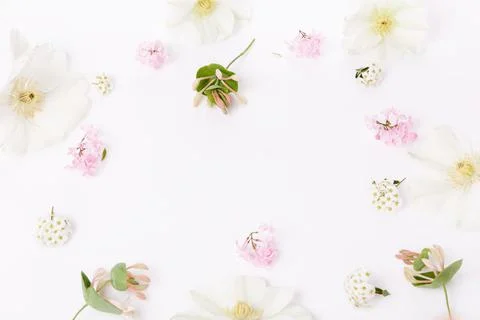 A festive composition of delicate pink and white spring flowers, Flat lay, top Stock Illustration