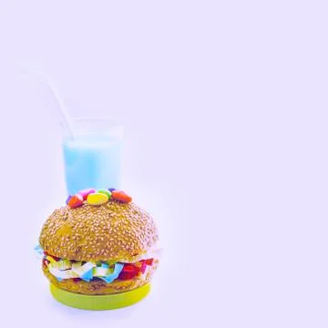 Festive composition drinks snacks holiday hamburger cookie tinsel confetti gi Stock Photos