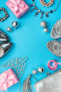 Festive composition flat lei set womens accessories jewelry gifts dress shoes Stock Photos