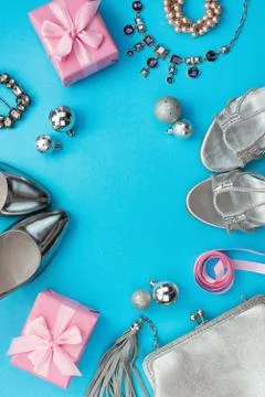 Festive composition flat lei set womens accessories jewelry gifts dress shoes Stock Photos