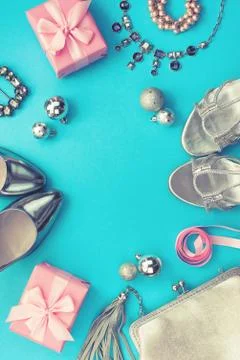 Festive composition flat lei set womens accessories jewelry gifts dress shoes Stock Photos