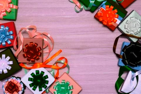 Festive composition of gift boxes. LGBT symbol box. In the corners of a wooden Foto stock