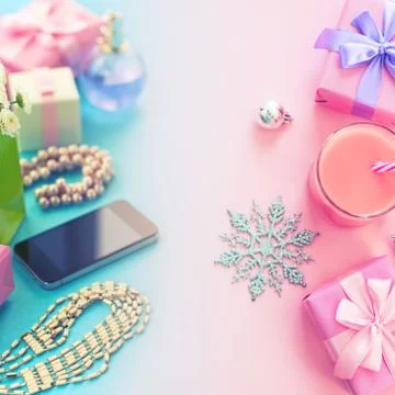 Festive composition set of boxes with gifts jewelry perfume mobile phone cock Stock Photos