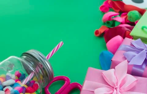 Festive composition set of gift boxes with balls candy cocktail materials. Stock Photos