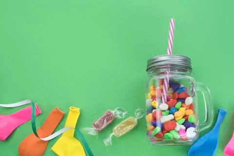 Festive composition set of gift boxes with balls candy cocktail materials. Stock Photos