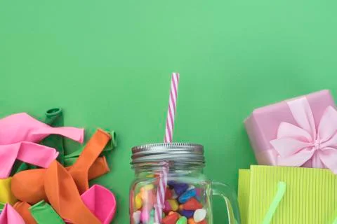 Festive composition set of gift boxes with balls candy cocktail materials. Stock Photos