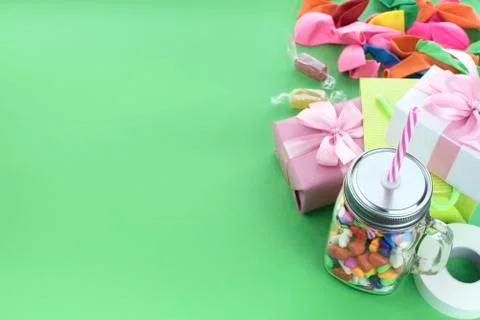 Festive composition set of gift boxes with balls candy cocktail materials. Stock Photos