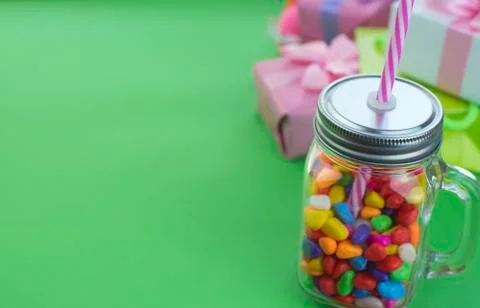 Festive composition set of gift boxes with balls candy cocktail materials. Stock Photos