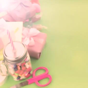 Festive composition set of gift boxes with balls candy cocktail materials. Stock Photos